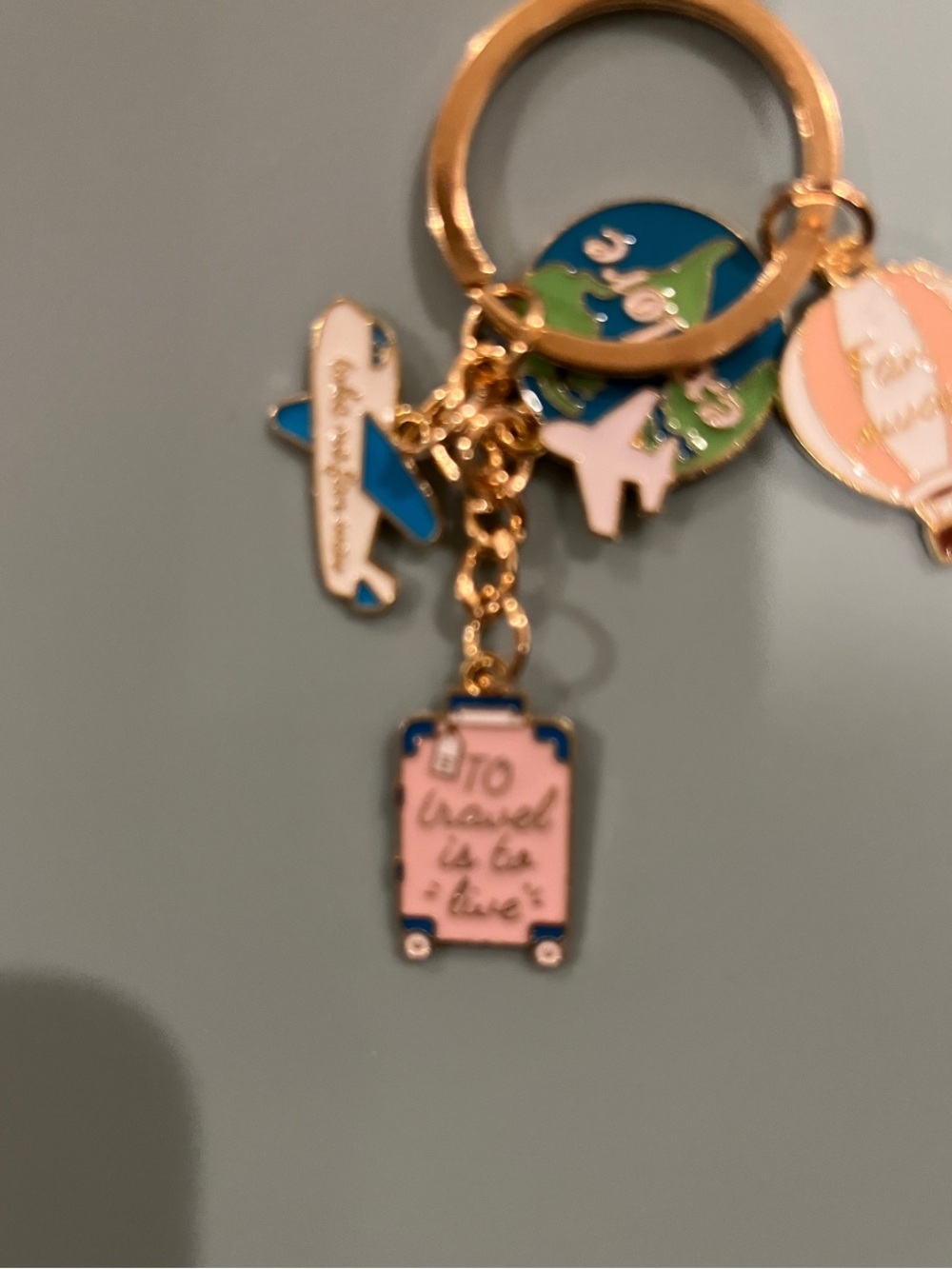 Travel Charm Keychain with Globe, Plane, Hot Air Balloon, and Pink Suitcase - Picture 4 of 5